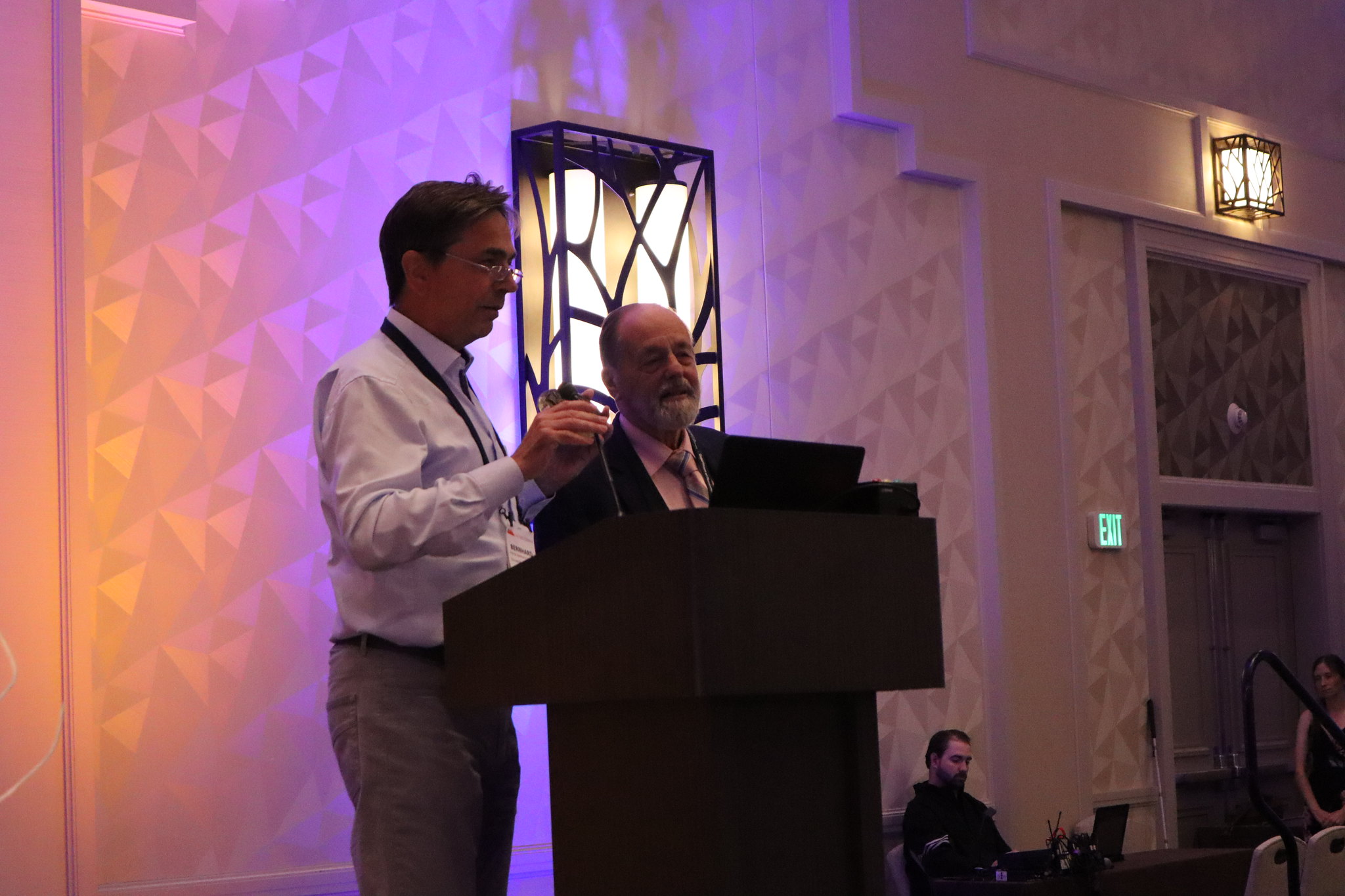Dr. Colenbrander taking the podium to accept the award